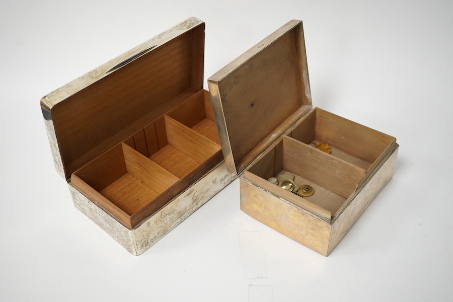 A George VI silver mounted rectangular cigarette box, with engraved Royal Engineers crest, London, 1940, 17.2cm and one other smaller late Victorian silver mounted cigarette box, Birmingham, 1896. Condition - poor to fai